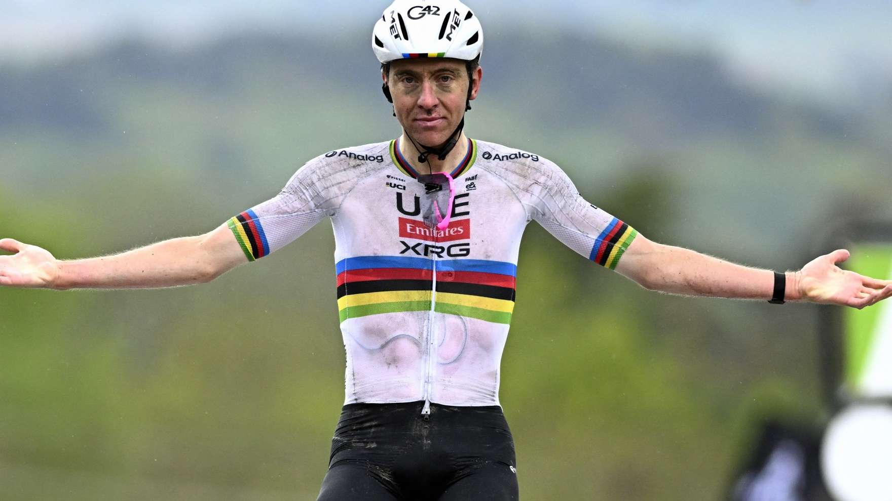 UAE Team Emirates' Slovenian rider Tadej Pogacar celebrates