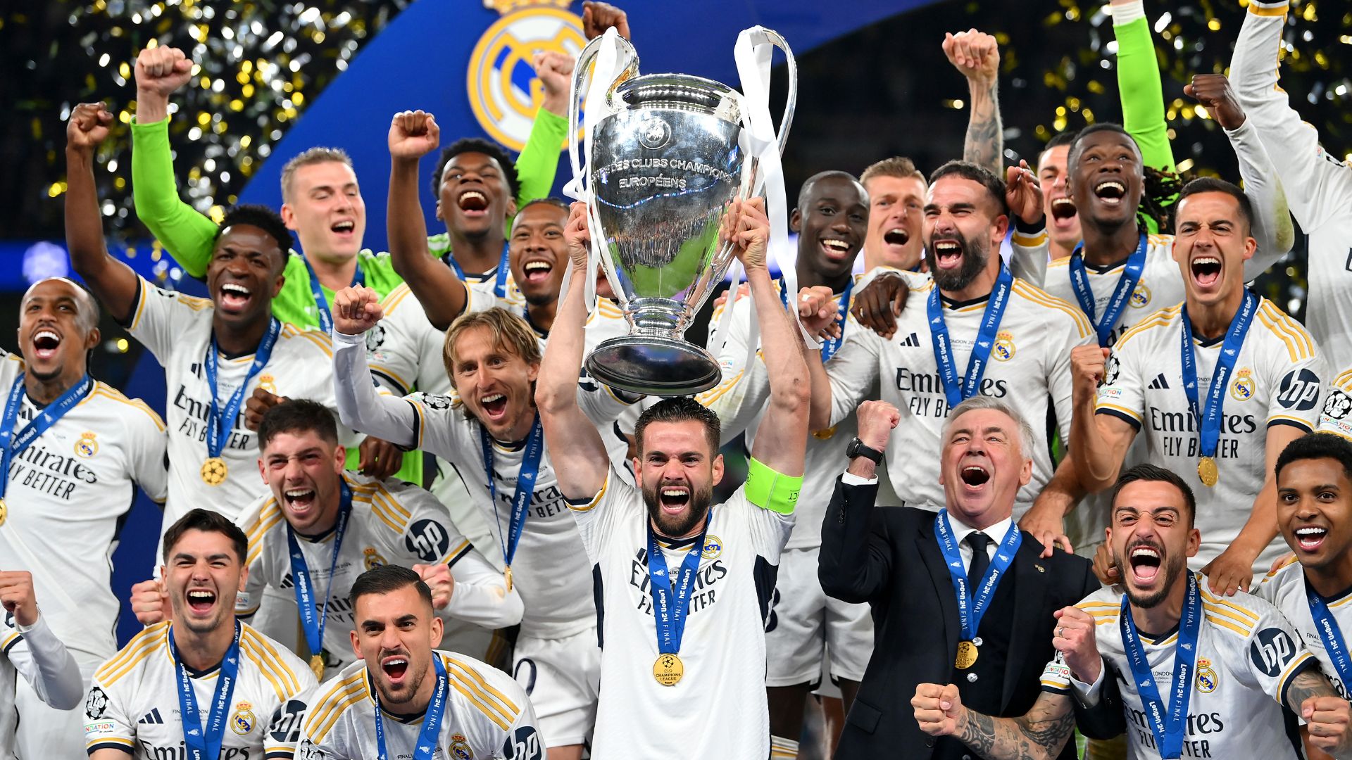 Nacho Fernandez of Real Madrid lifts the UEFA Champions League Trophy