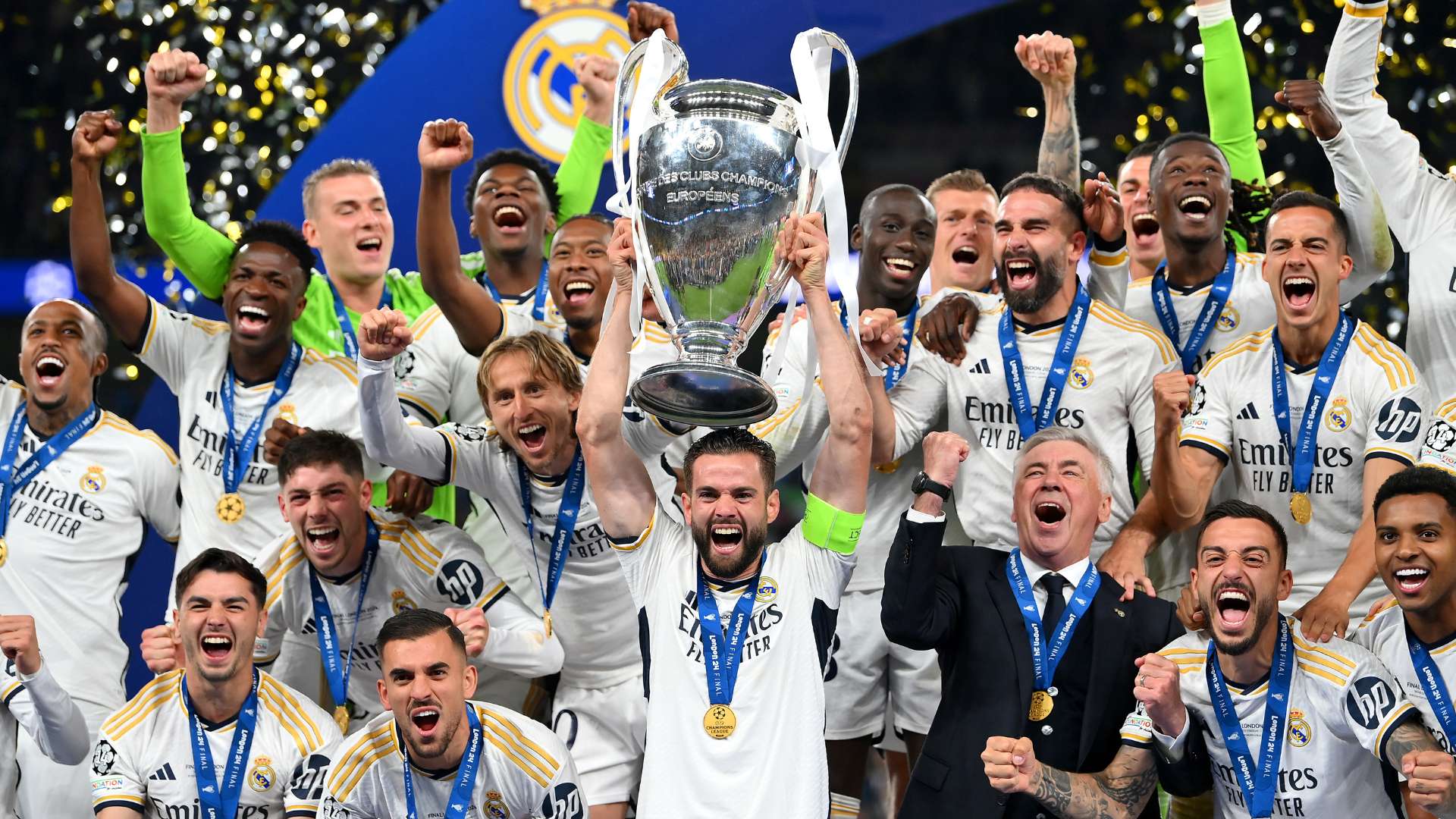 Nacho Fernandez of Real Madrid lifts the UEFA Champions League Trophy