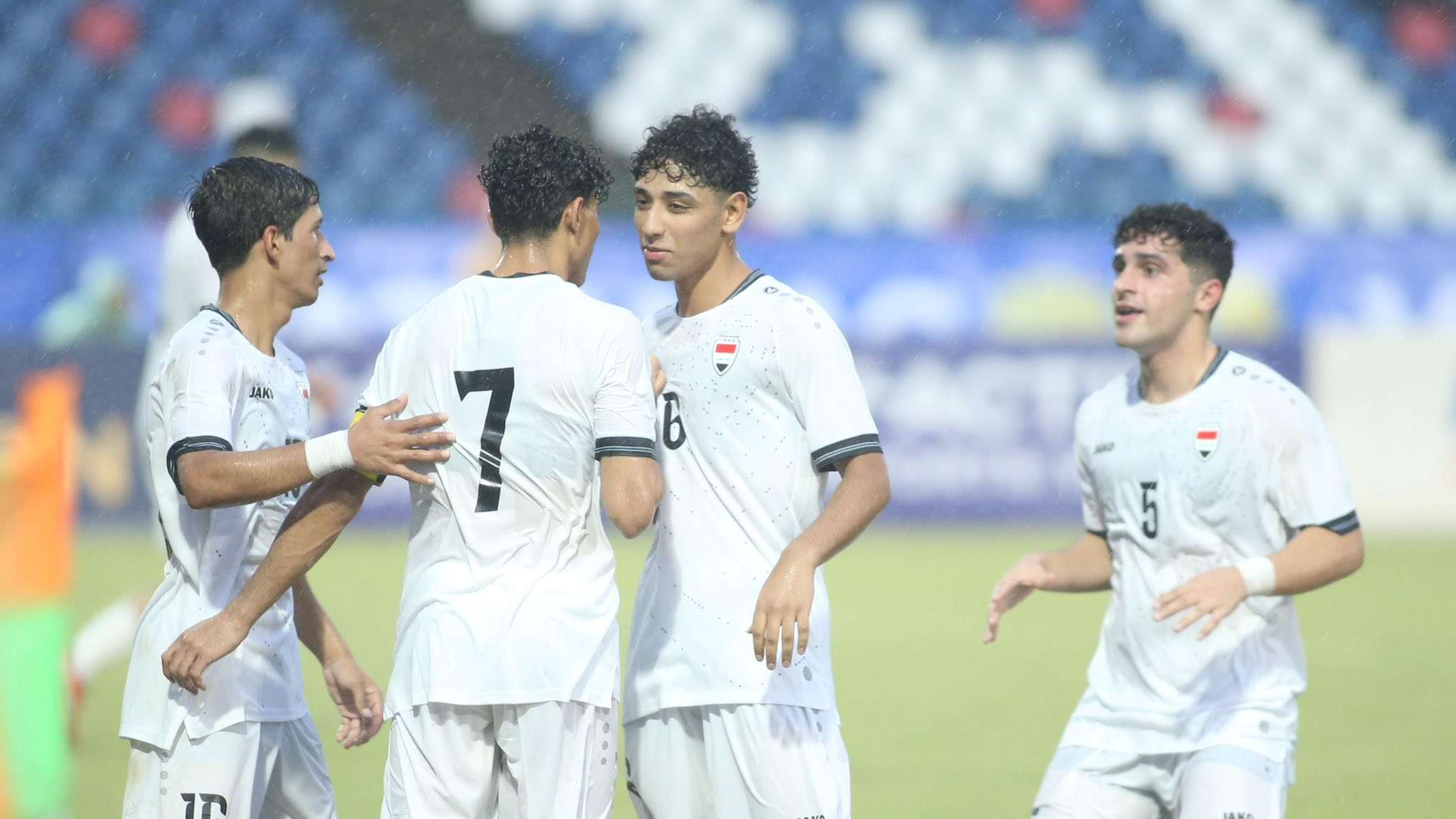 احتفال لاعبي المنتخب الأولمبي العراقي