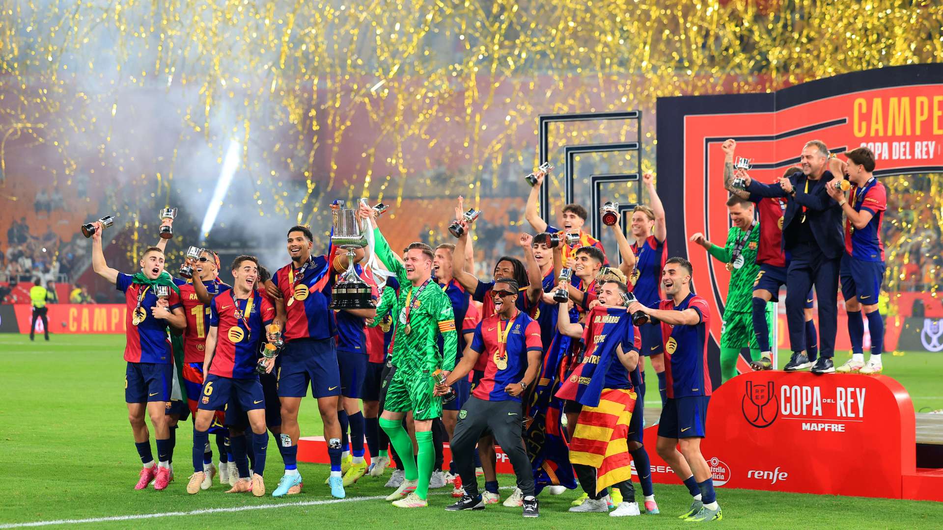 Ronald Araujo and Marc-Andre ter Stegen of FC Barcelona lift the Copa del Rey trophy