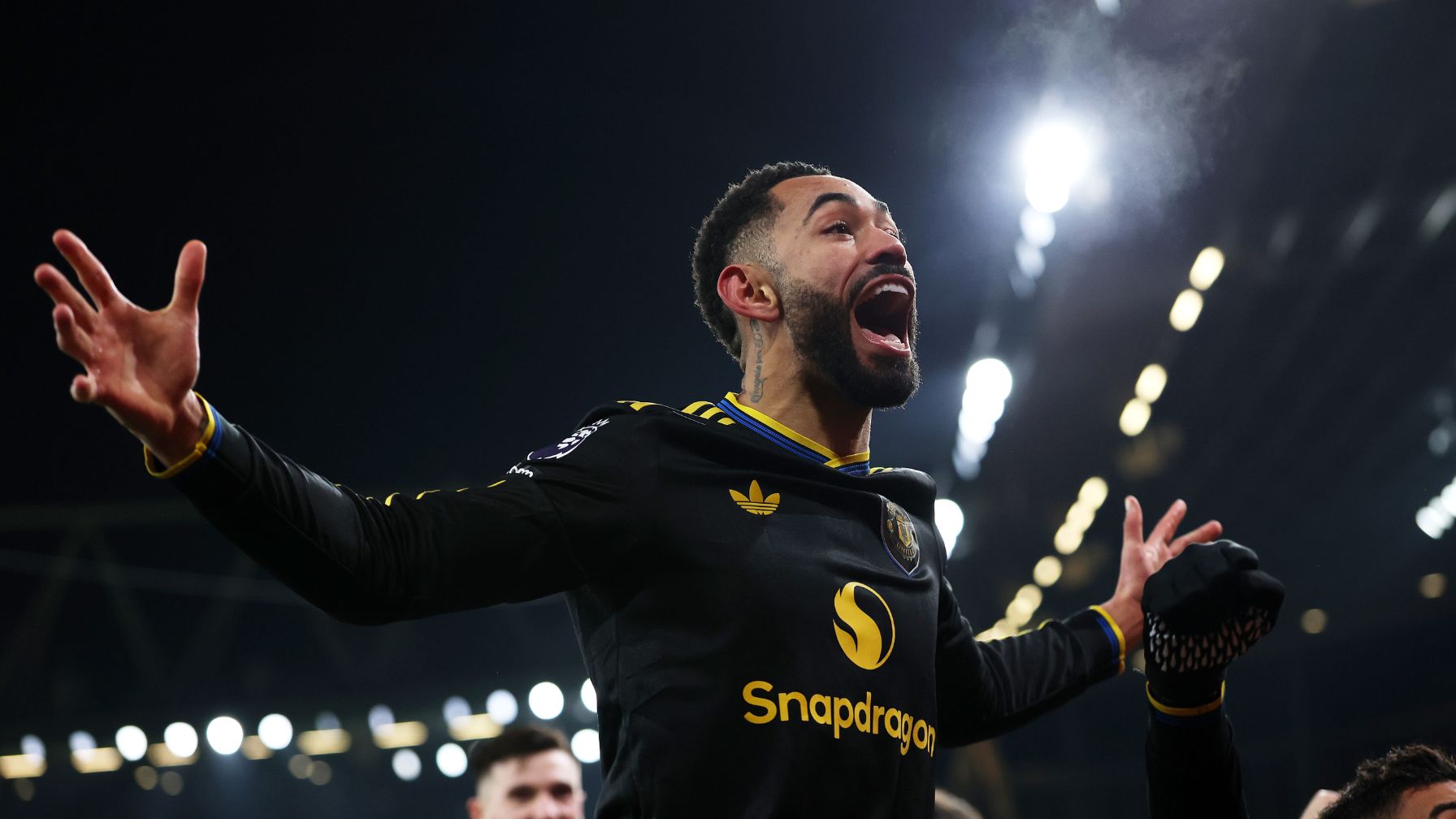 Matheus Cunha of Manchester United celebrates scoring his team's third goal during the Premier League match