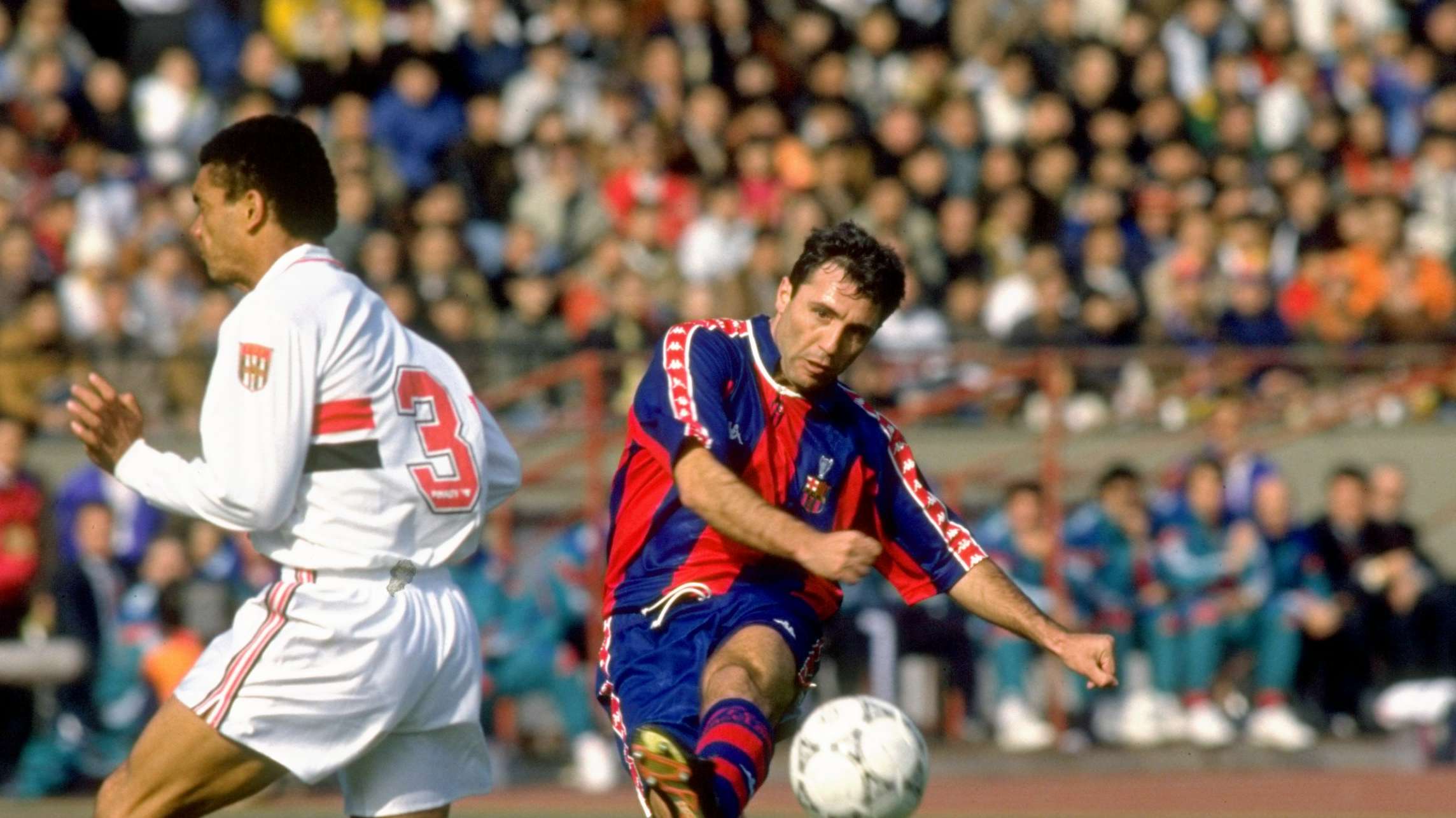 Hristo Stoichkov of Barcelona and Adilson of Sao Paulo