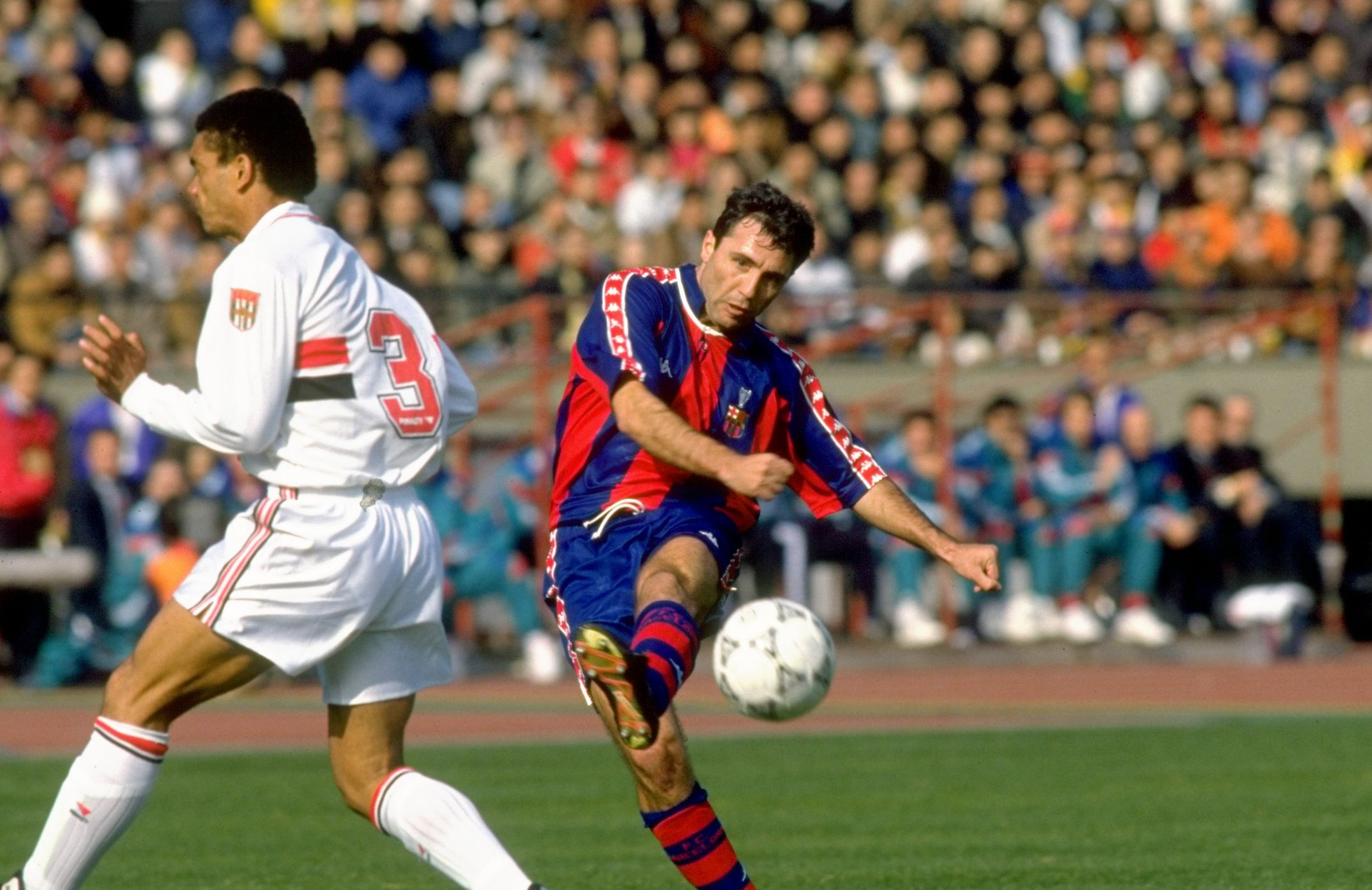 Hristo Stoichkov of Barcelona and Adilson of Sao Paulo