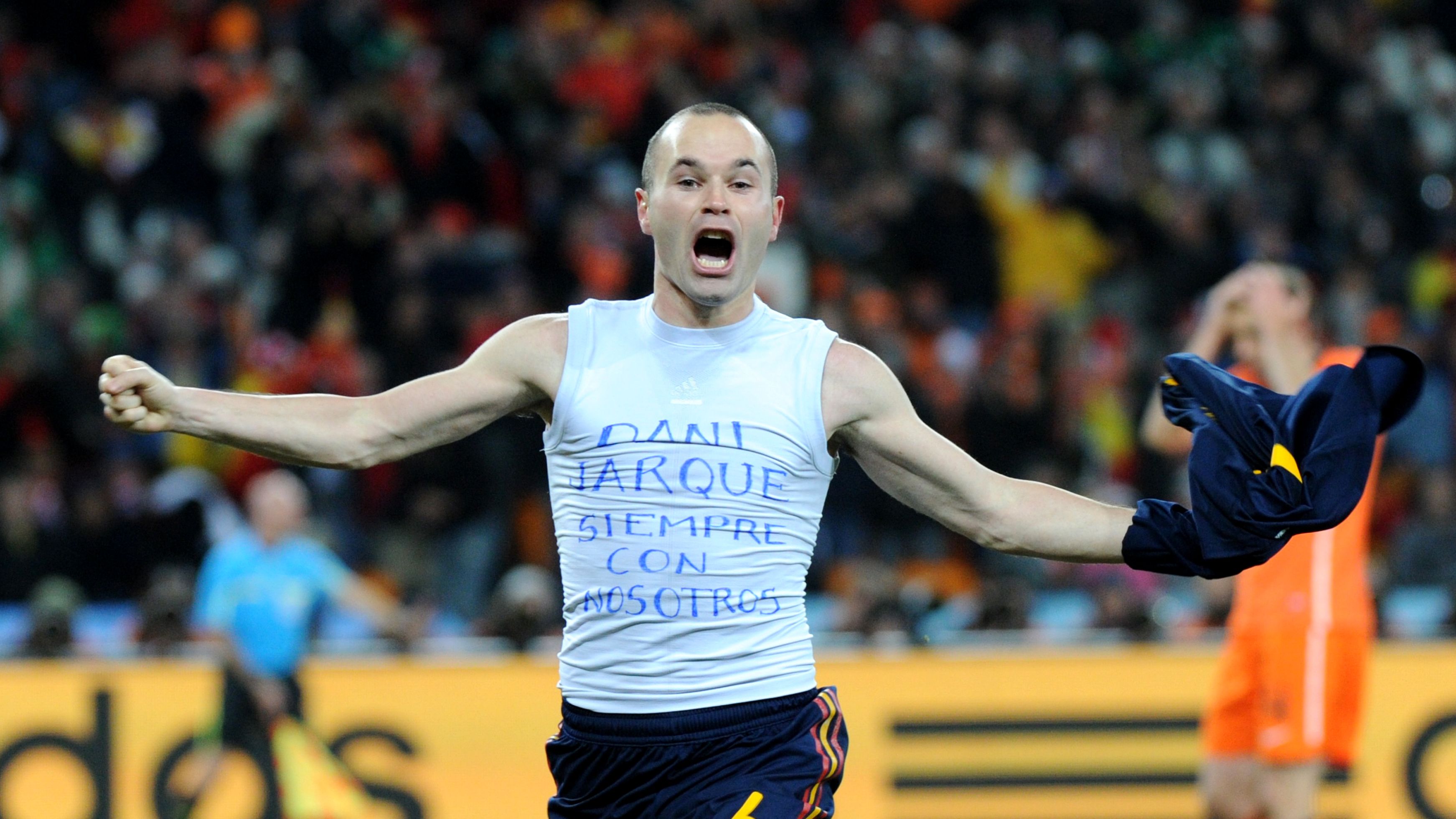 Spain's midfielder Andres Iniesta celebr