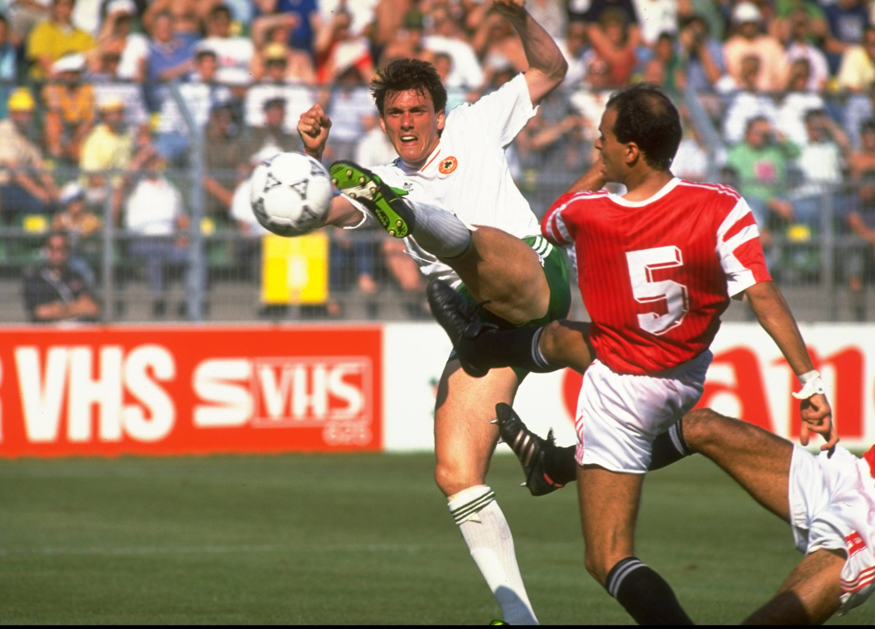 Tony Cascarino of Eire and Hesham Yakan of Egypt