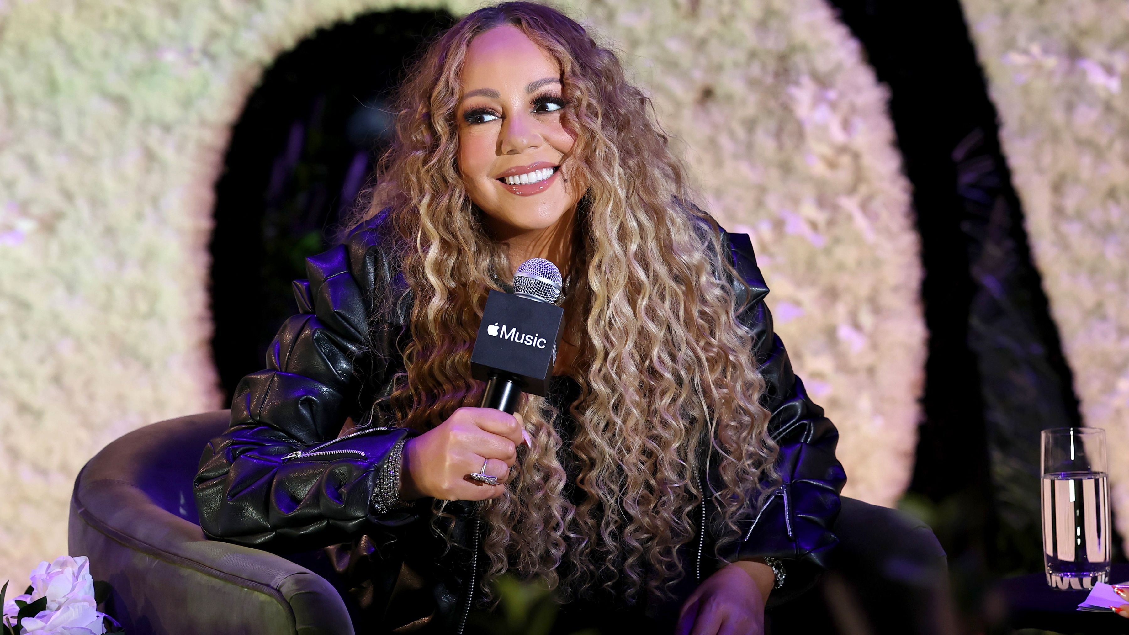Apple Music and gamma. Present “Flowers: Mariah Carey and SZA in Conversation"