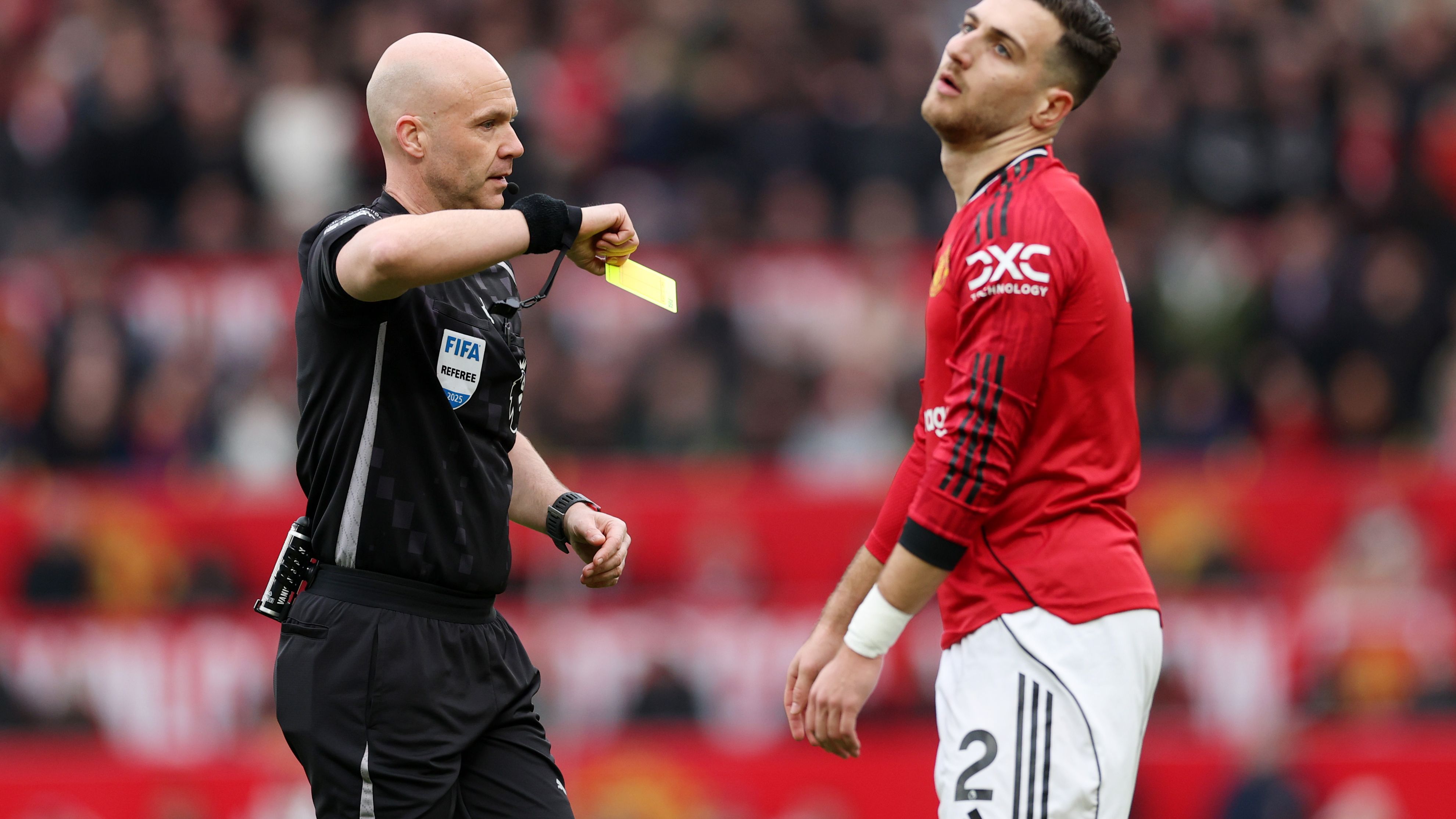 Manchester United vs Manchester City derby photo at Old Trafford featuring Dalot