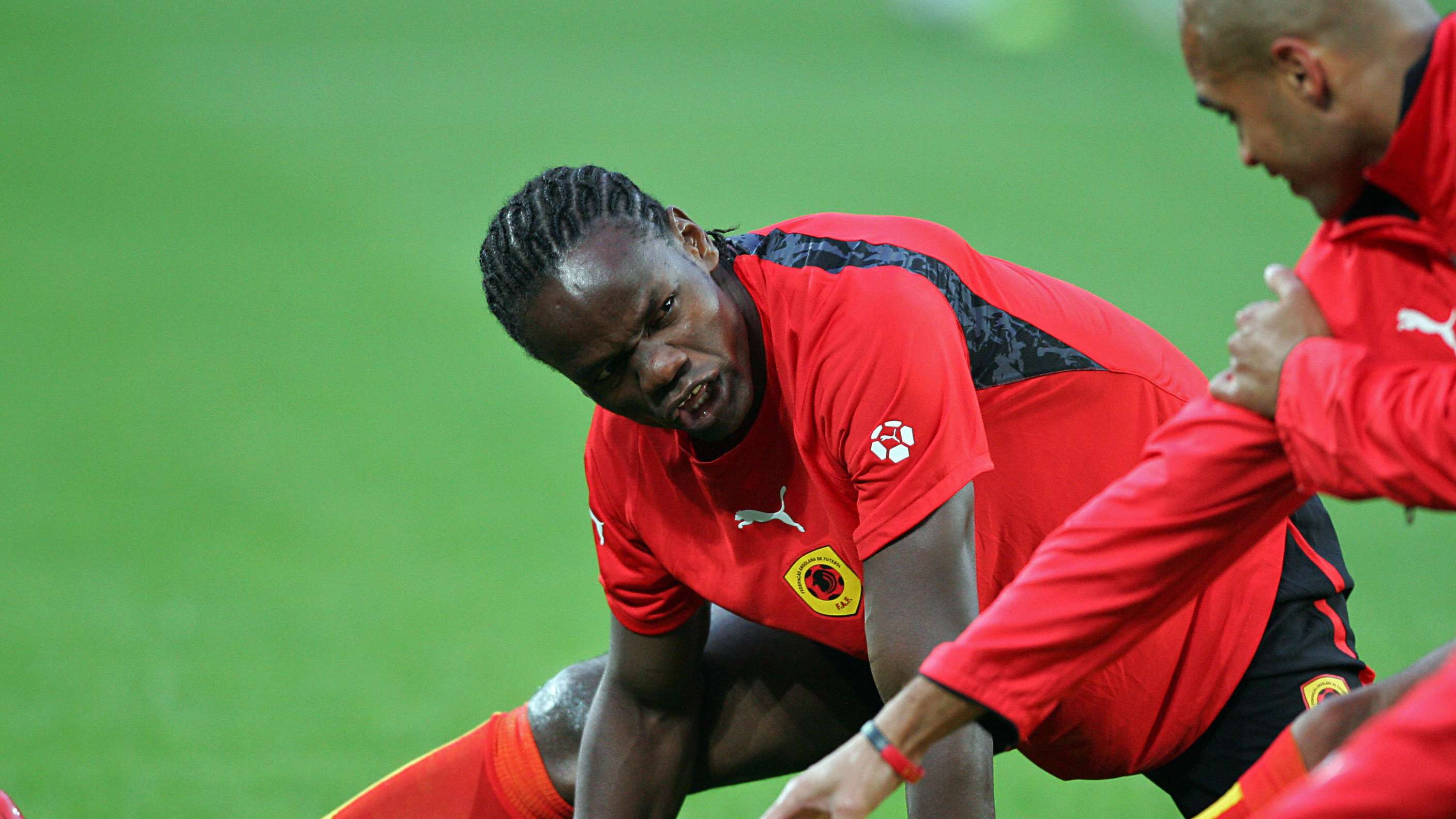 Angolan forward Akwa warms-up prior to t