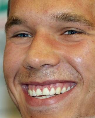 بودولسكي يبتسم أثناء المؤتمر الصحفي