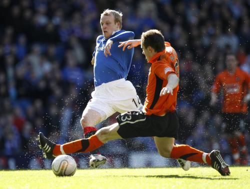 2011-04-022011-04-02t152200z_01_dmr04_rtridsp_3_soccer-europe-scotland_reuters