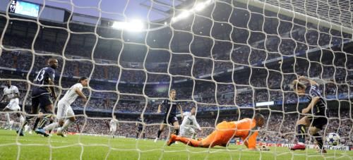 2011-04-052011-04-05t200321z_01_sps27_rtridsp_3_soccer-champions-real_reuters