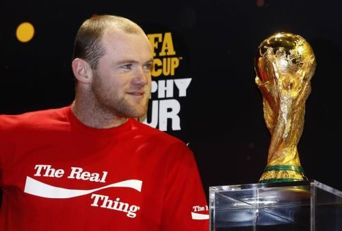 2011-04-062011-04-06t173251z_01_sin03_rtridsp_3_england-rooney-cocacola_reuters