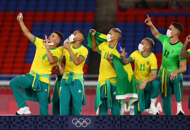 2021-08-07t153406z_939510442_sp1eh87178q01_rtrmadp_3_olympics-2020-fbl-m-team11-medal_reuters