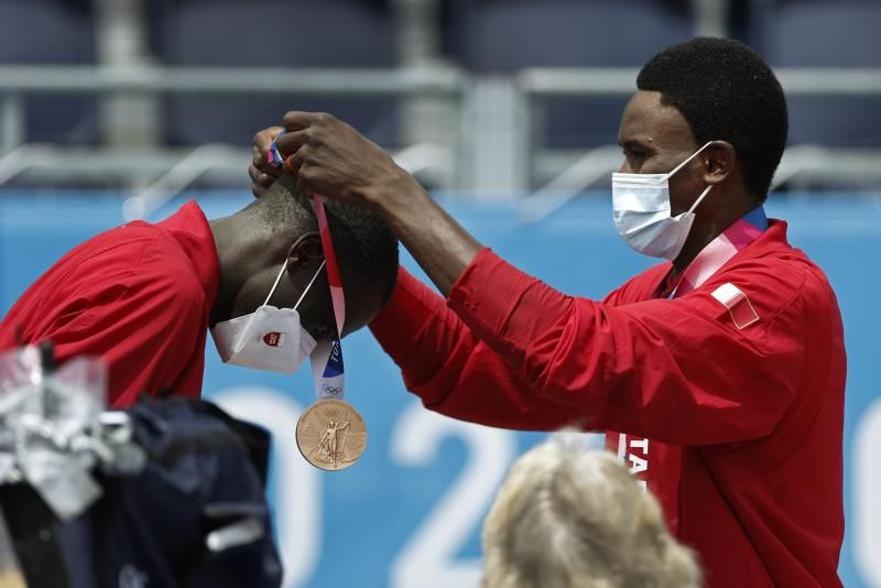 2021-08-07t043011z_1646255673_sp1eh870ci6uo_rtrmadp_3_olympics-2020-vbv-m-team2-medal_reuters