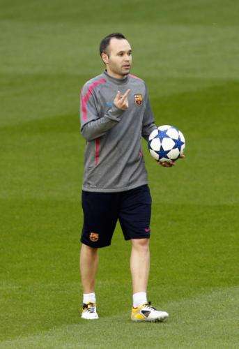 2011-04-262011-04-26t200150z_01_svp100_rtridsp_3_soccer-champions-iniesta-javascript-searchbyslug-ouks_reuters