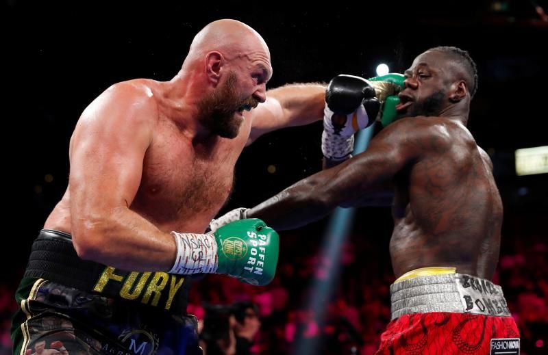 2021-10-10t055126z_2112160177_up1ehaa0fyn2t_rtrmadp_3_boxing-heavyweight-fury-wilder_reuters