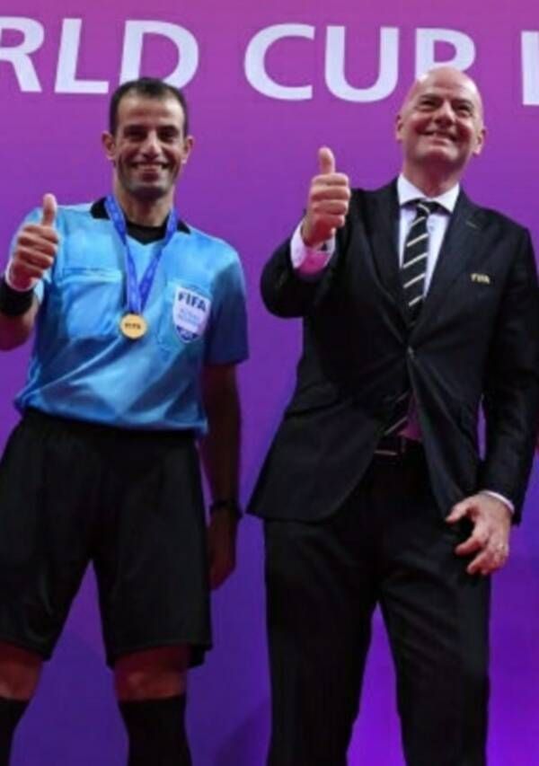 الحكم محمد حسن ورئيس الفيفا