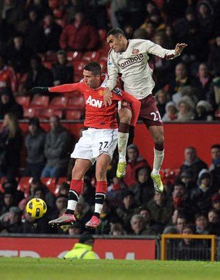 لقطة أرشيفية للاعب أحمد المحمدي مع فريقه أمام مانشستر يونايتد