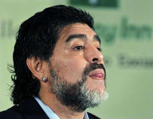 2011-05-162011-05-16t122652z_01_sin77_rtridsp_3_dubai-maradona_reuters