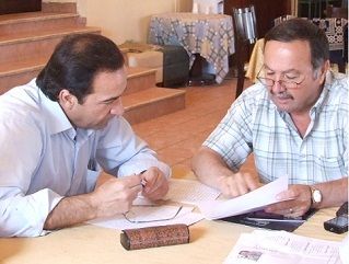 خير ودحبور خلال توقيع العقد