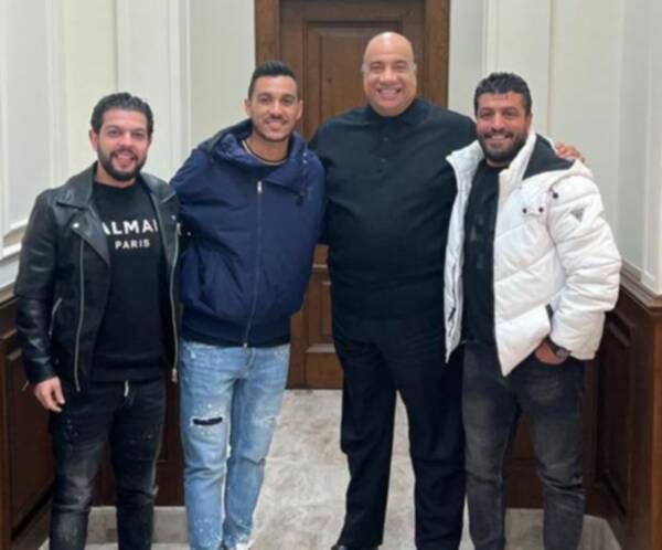 إبراهيم حسن مع مصيلحي بعد التوقيع