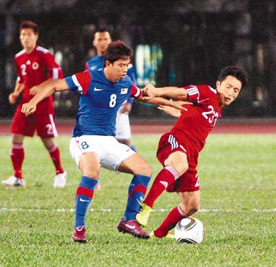 صورة من المباراة الودية بين منتخبي هونج كونج  وماليزيا