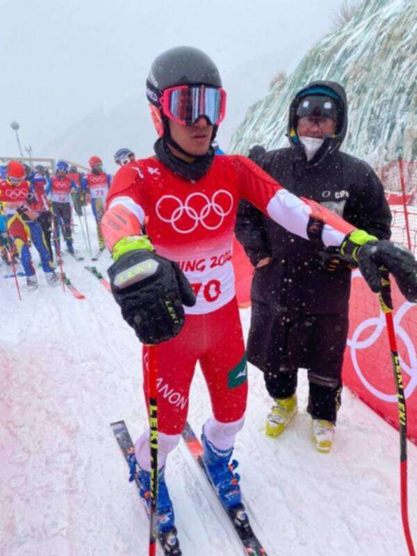 سيزارعرنوق وبجانبه مدربه قبيل إنطلاق السباق