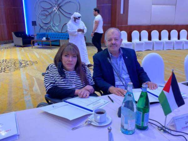 أبو الرز ومها البرغوثي خلال اجتماع العمومية