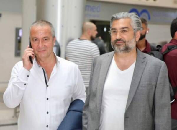 أسعد سبليني (يسار) 