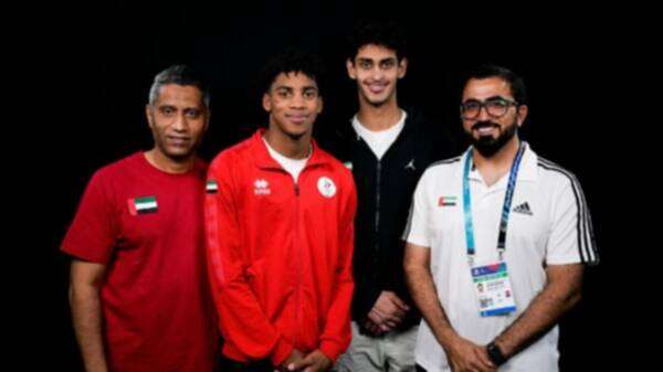 المطروشي مع مدربيه