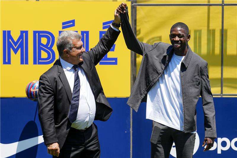 عثمان ديمبلي وخوان لابورتا