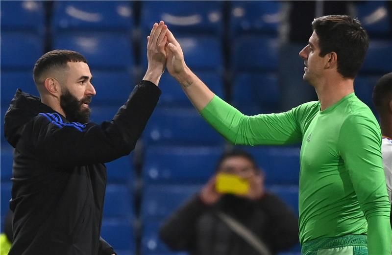 كورتوا وبنزيما