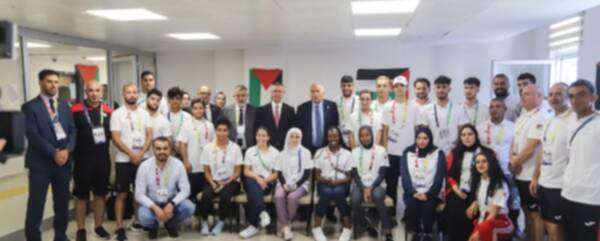 الرجوب مع بعثة فلسطين