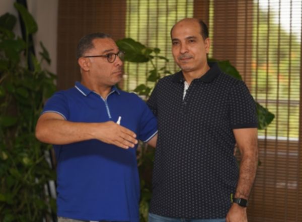 كشري ورئيس إنبي أيمن الشريعي