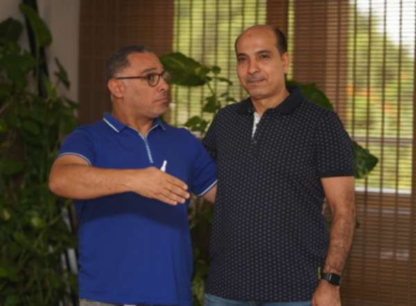 كشري ورئيس إنبي أيمن الشريعي