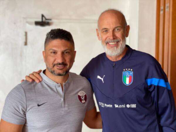 وسام رزق والمدرب باولو نيكولاتو