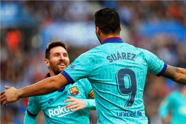 سواريز وميسي