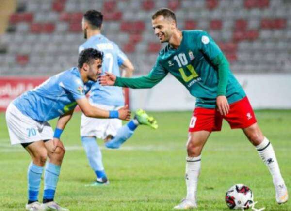 من لقاء سابق بين الوحدات والفيصلي