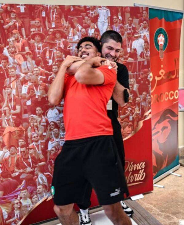 نورمحمدوف مع لاعب المغرب