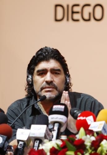 2011-06-042011-06-04t113341z_01_dub06_rtridsp_3_uae-maradona_reuters