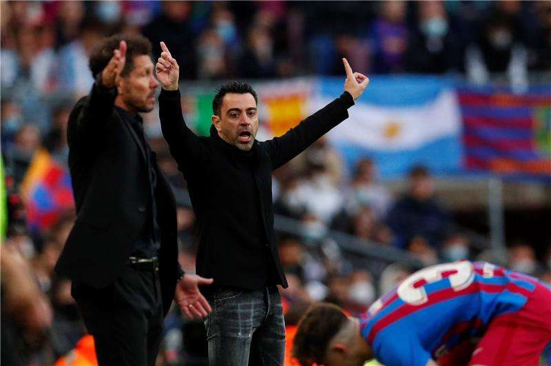 سيميوني وتشافي