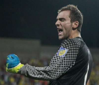 Portugal's goalkeeper Mika celebrates after winning 