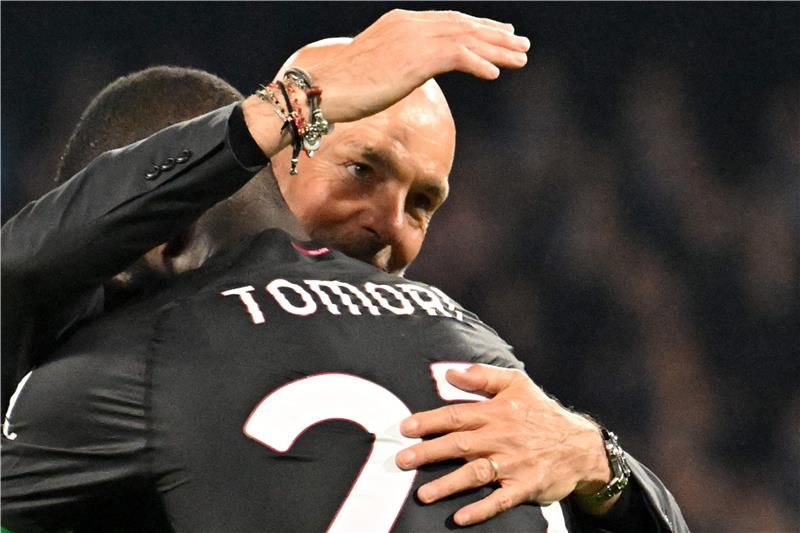 بيولي مع فيكايو توموري