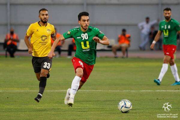 من لقاء سابق بين الوحدات والحسين إربد