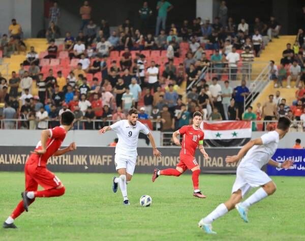 من مباراة العراق والأردن