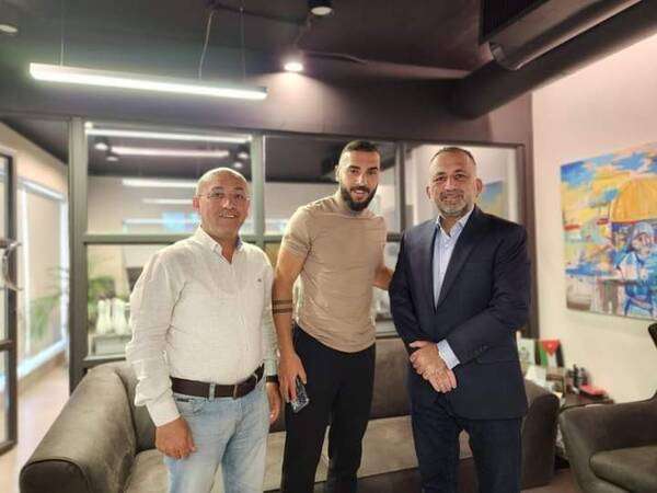 عصام يتوسط حوامدة والاسمر