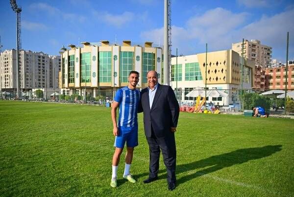 محمد مصيلحي رئيس الاتحاد مع هشام صلاح