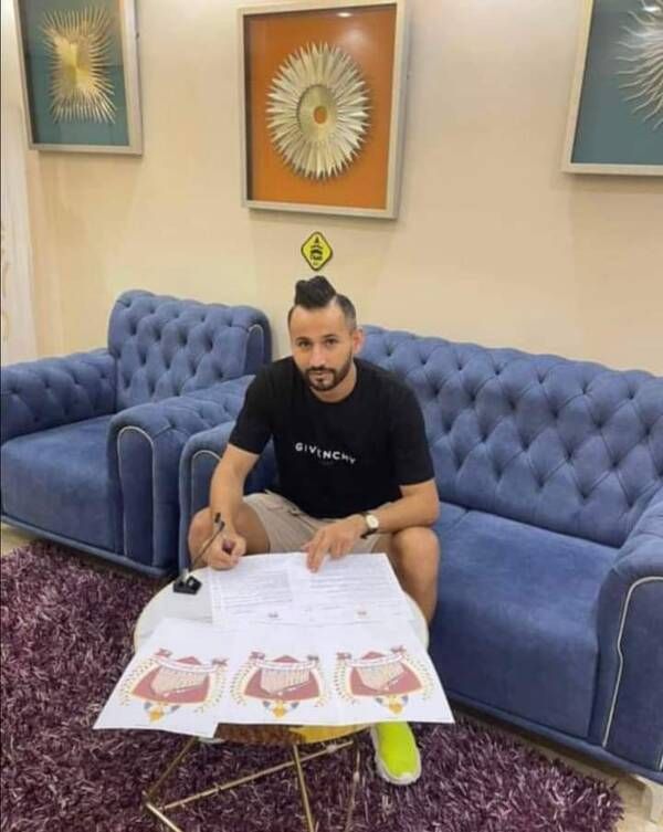 من توقيع مفتاحي