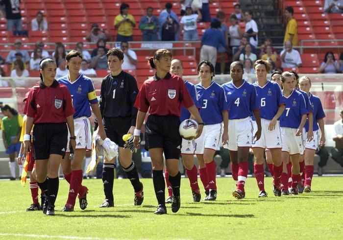 France-teammates-enter-the-field-Saturday-September-27-2003-at-RFK-Stadium-Washington-D-C-during-the-opening-round-of-the-FIFA-Women-s-World-Cup-USA-2003?io=transform:fill,width:700&quality=100
